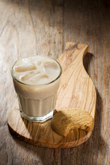 Glass of Ice coffee and cookies.