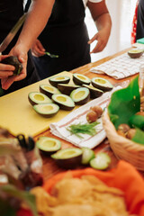 Avocados prepared for guacamole during a cooking class