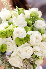 Obraz na płótnie Canvas Close up of white rose wedding bouquet