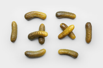 Pickled cucumbers on grey background