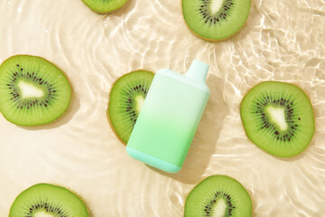 Electronic cigarette with kiwi in water on beige background