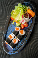 sushi set with fresh salad