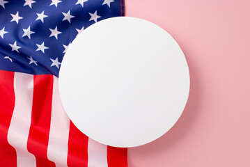 Fototapeta premium Paying tribute to female workers on Labor Day. Top view image of an American flag accompanied on a pink isolated background. Empty round frame perfect for advertisements or text placement