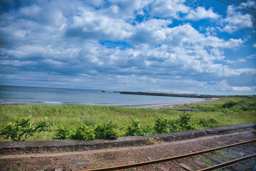 A view from inside a Shinkansen train in Japan.