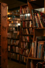 old books on the shelves in a bookstore