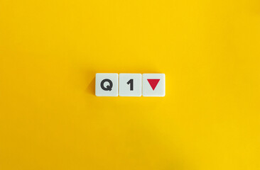 Quarter 1 Decline, Downtrend Indicator. Text Q1 and a Red Downward-pointing Arrow on White Square Blocks on a Solid Yellow Background.