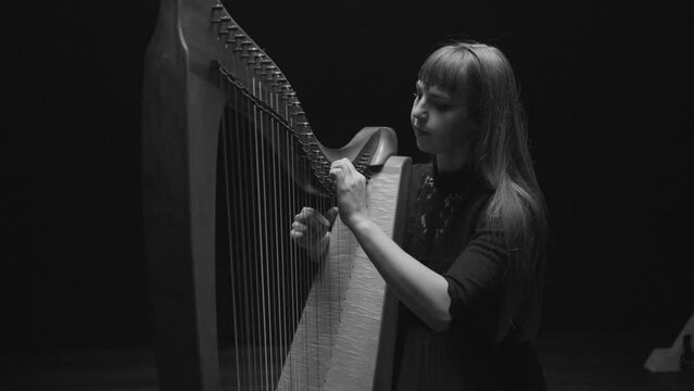 Woman Playing Harp
