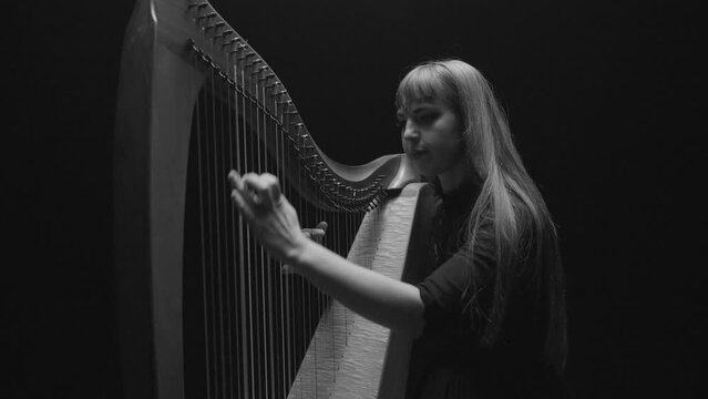 Woman Playing Harp