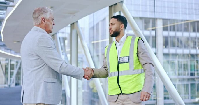 Businessman, contractor or handshake for partnership, deal success or agreement in building together. Mature CEO shaking hands with architect or engineer for b2b, hiring or architecture recruitment