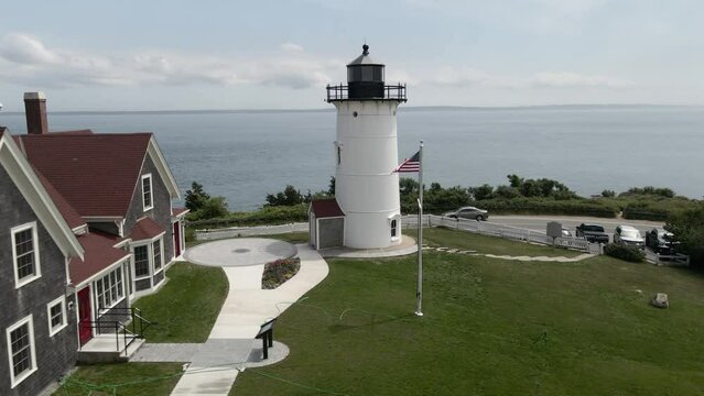 Nobska Lighthouse Stands Tall Near The Sea At Cape Cod On A Breezy Day In Woods Hole, Massachusetts, United States. aerial