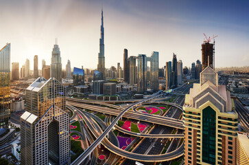 Beautiful aerial sunrise in Dubai centre with panoramic skyline view, UAE