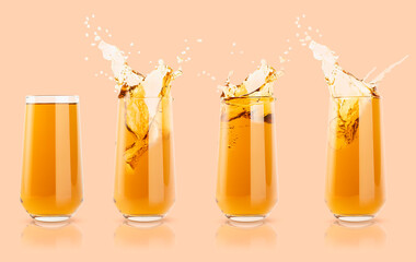 Set of four apple yellow cold juices in glass with reflection, calm and  bright splashes, drops flying, swirl pastel beige background. Refreshing healthy summer gold pear beverage with splashing.