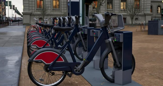 Row of Green bicycles for rent. Electric bicycle charging station. Shared electric bikes parked on city street early in the morning
