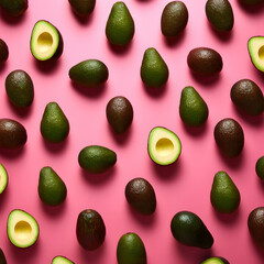 Avocados isolated on pink background. Minimalistic concept. Pink and green