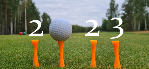 Happy New Year 2023 golf ball on green golf for new healthy sport