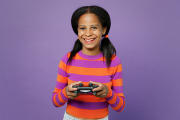 Little kid teen girl of African American ethnicity 15-16 year old wear striped orange sweatshirt...
