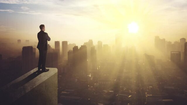 Confident businessman standing on the building rooftop