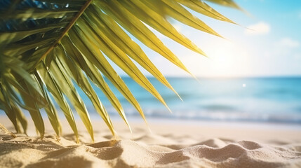 Golden sand at tropical beach. Beautiful background for summer vacation and travel. blurry palm leaves and sea on sunny day