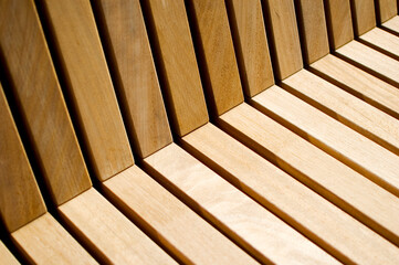 Obraz na płótnie Canvas Close up of a wooden bench.