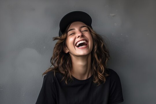 portrait of young happy smiling woman wearing hat