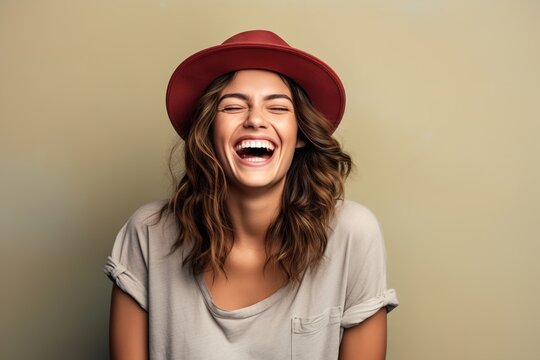smiling girl in a hat with happy face