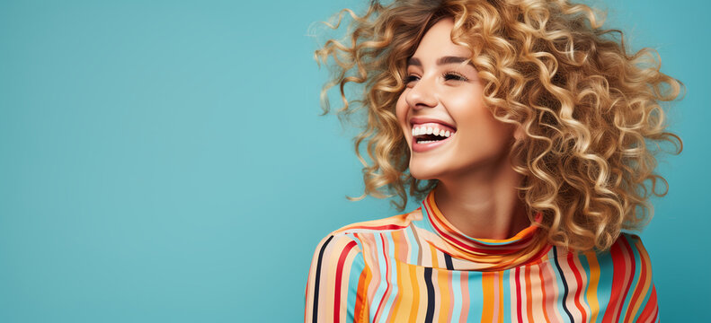 Cute blond curly hair woman laughing isolated on blue color background