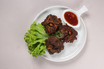 Buntut Sapi Bakar or Roasted Oxtail or Grilled Oxtail.