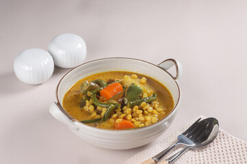 Dalca Sayur or Vegetables Dalca is a Stewed Vegetables Curry with Lentils, Famously Served with Briyani or Tomato Rice.