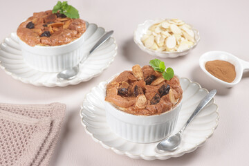 Klappertaart is a Cake made from Young Coconut and Milk, Topping with Cinnamon Powder. This Cake From Manado Indonesia Influenced by Dutch Pastries. 