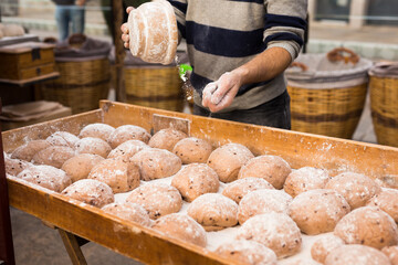 Yeast dough in the form of loaves waiting to be cooked
