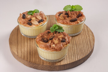 Klappertaart is a Cake made from Young Coconut and Milk, Topping with Cinnamon Powder. This Cake From Manado Indonesia Influenced by Dutch Pastries. 