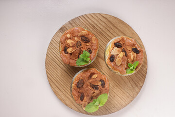 Klappertaart is a Cake made from Young Coconut and Milk, Topping with Cinnamon Powder. This Cake From Manado Indonesia Influenced by Dutch Pastries. 