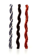 Twisted pipe cleaners in two tone twists, isolated on white, standing up like bar graphs, Generative AI