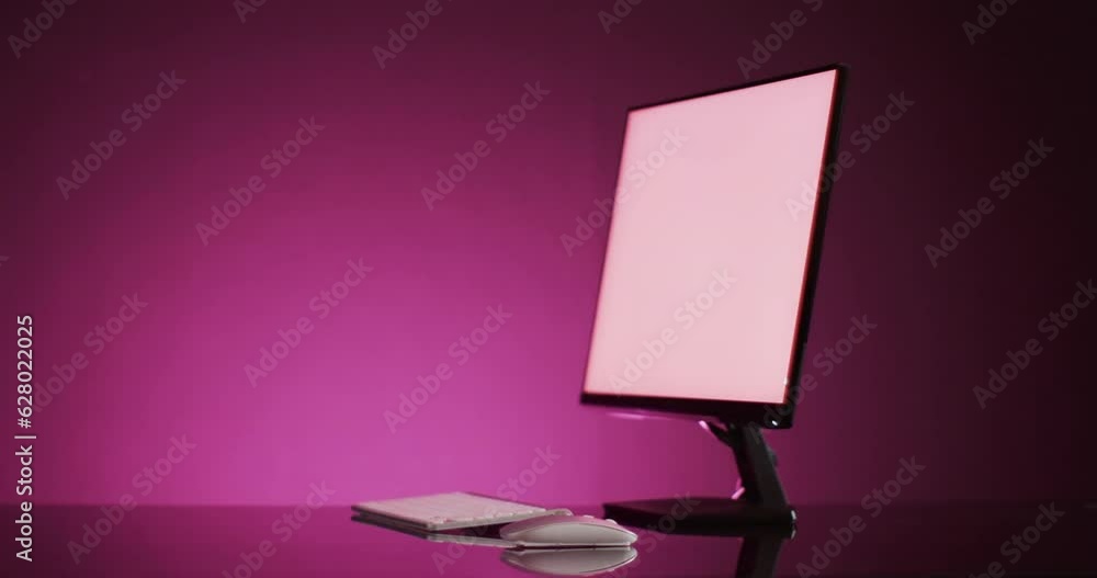 Aufkleber video of computer with blank screen, keyboard and mouse with copy space on neon background