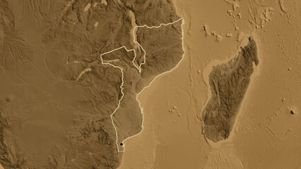 Shape of Mozambique. Outlined. Sepia elevation.