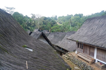A traditional house with a unique architecture, made of wood and bamboo with a roof of palm fiber in Kampung Naga