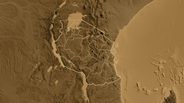 Shape of Tanzania with regional borders. Sepia elevation.