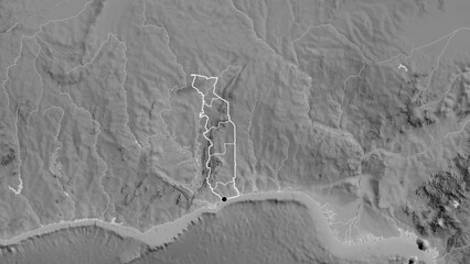 Shape of Togo with regional borders. Grayscale. © zelwanka