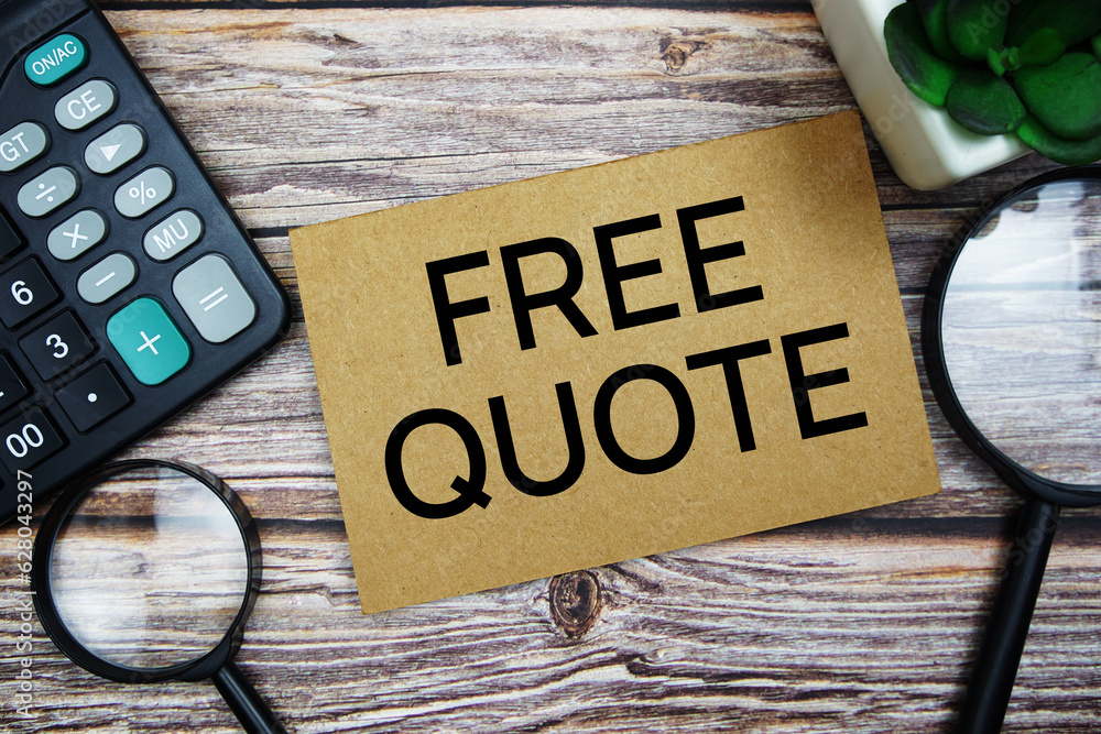 Poster free quote text message with calculator and magnifying top view on wooden background