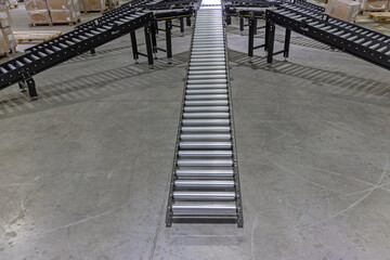 Fototapeta na wymiar Conveyor Rollers Gravity Slope