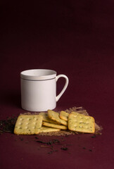 Crunchy  biscuit for healthy life with wheat and cup of tea for breakfast.