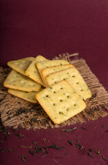 Crunchy  biscuit for healthy life with wheat and cup of tea for breakfast.