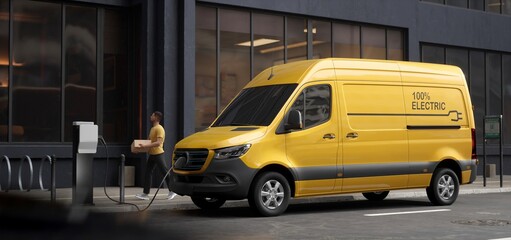 Generic electric EV delivery van charging on a charging station in city downtown © ivanbaranov