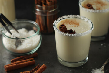 Two glasses with traditional Puerto Rico cocktail Coquito