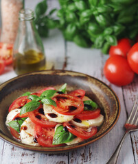 A bowl with traditional Italian caprese salad