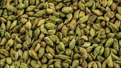 dried cardamom, food background. Long banner format. top view - obrazy, fototapety, plakaty