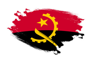 Abstract stroke brush textured national flag of Angola on isolated white background