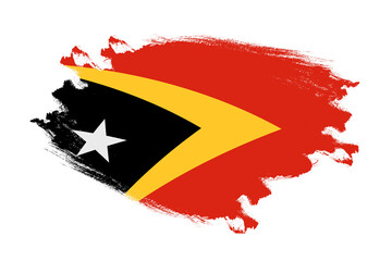 Abstract stroke brush textured national flag of East timor on isolated white background