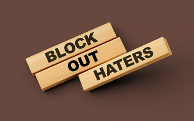 Wooden blocks with block out haters word on colorful isolated background 3d illustration