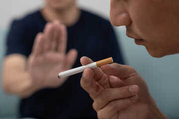 No smoking. Man stop smoke, refuse, reject, break take cigarette, say no. quit smoking for health....